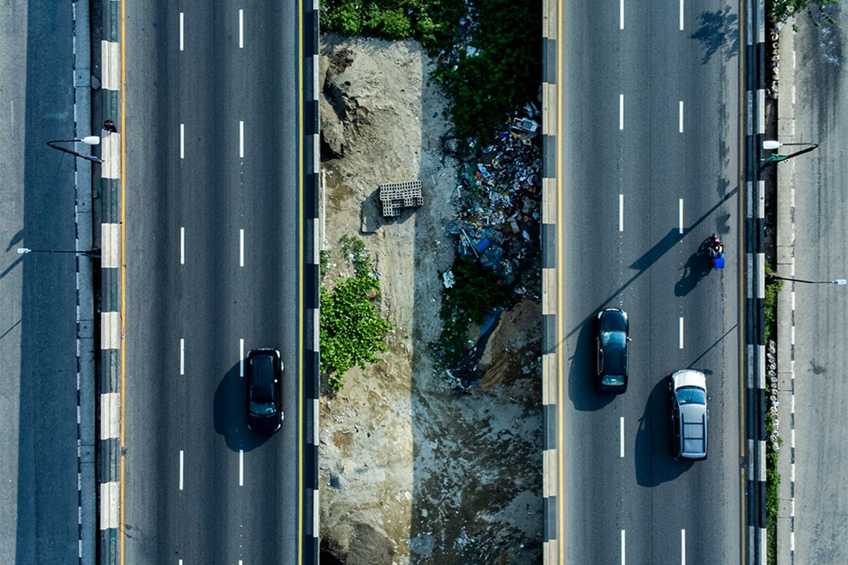 An aerial view of city roads with traffic