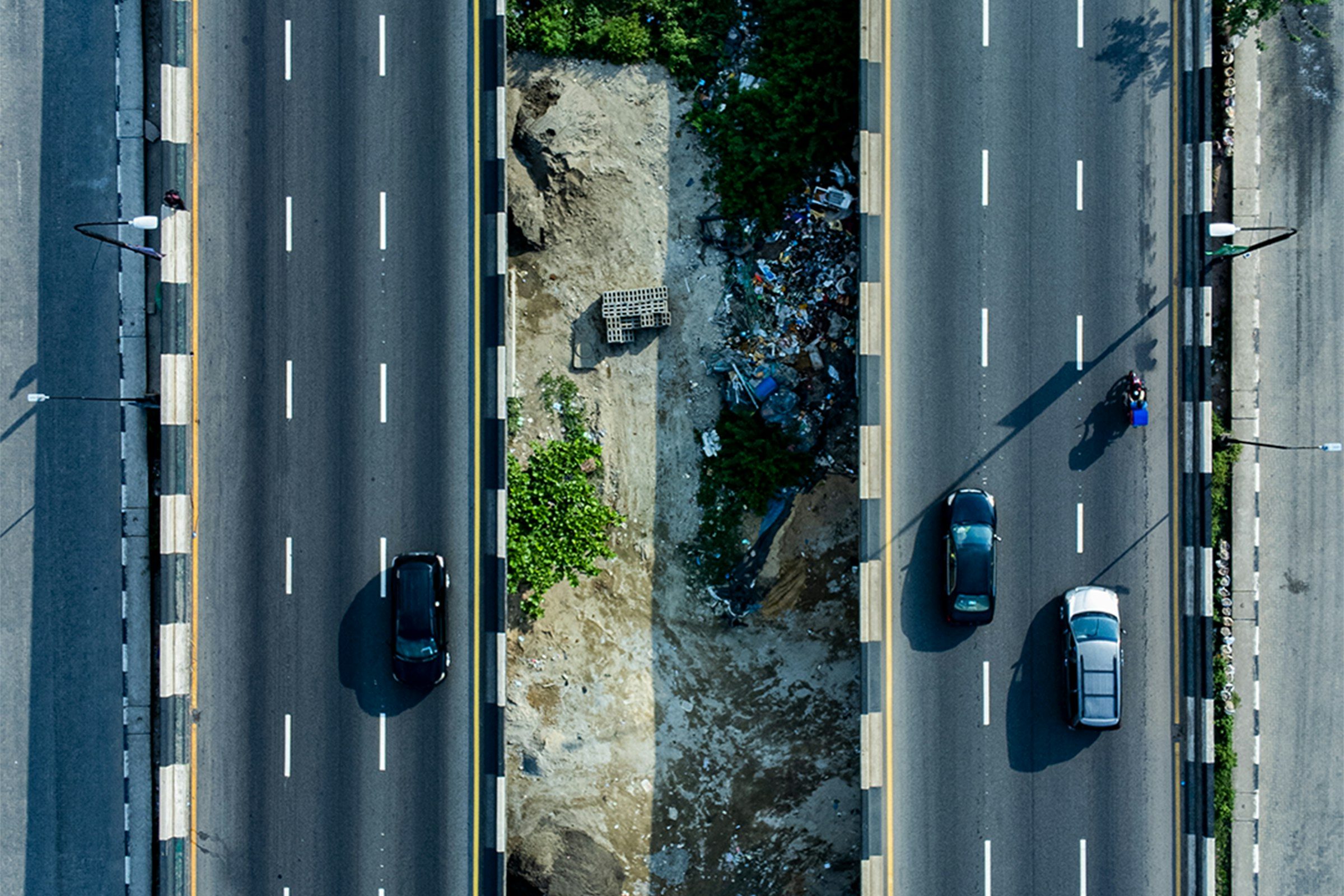 An aerial view of city roads with traffic
