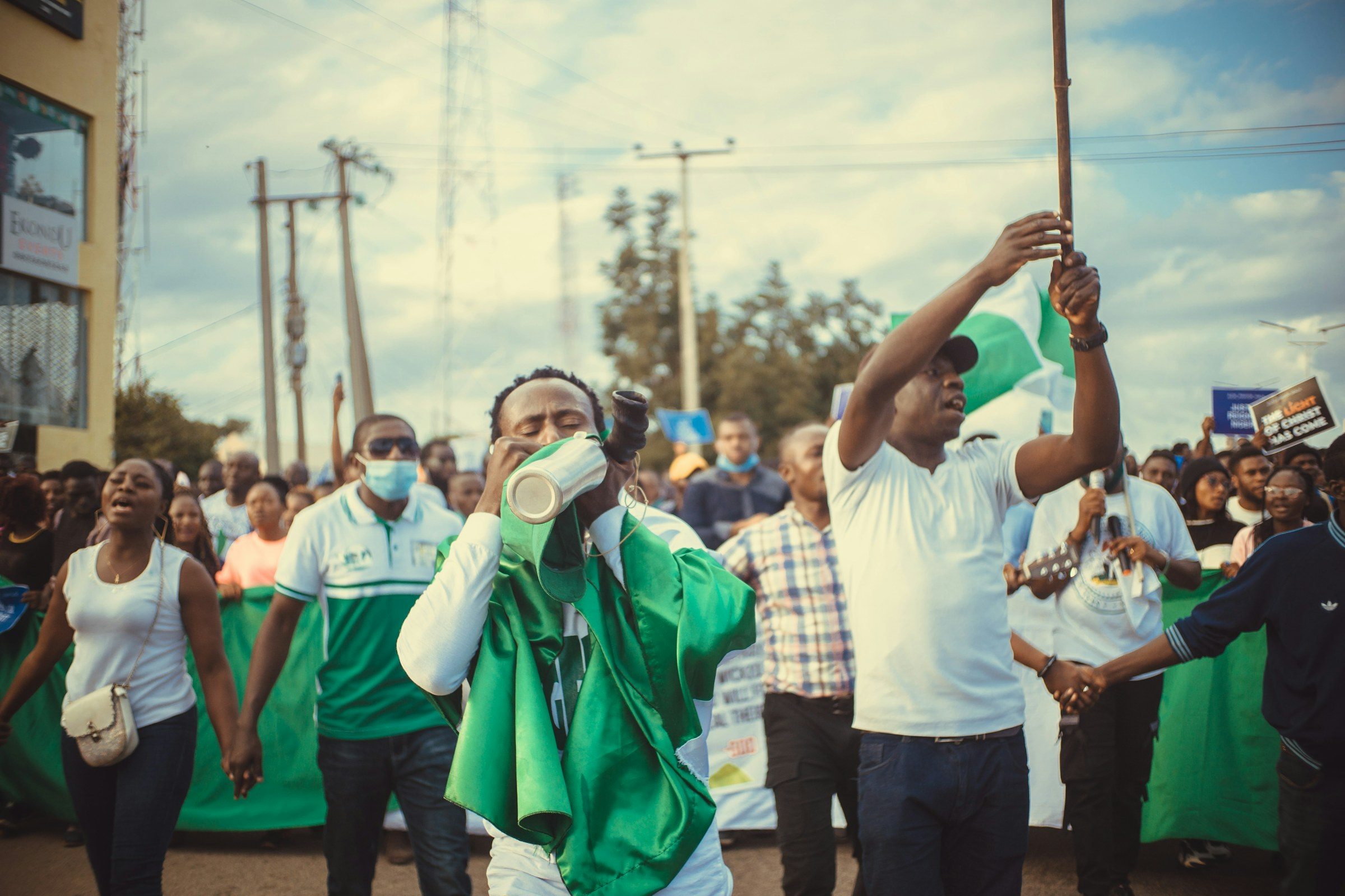 Supporters with Nigerian flags at a rally
