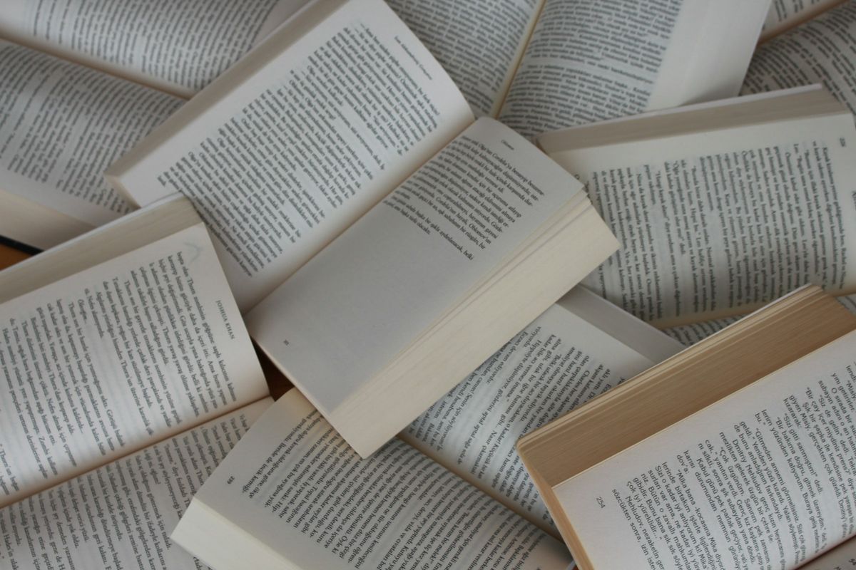 A pile of open books
