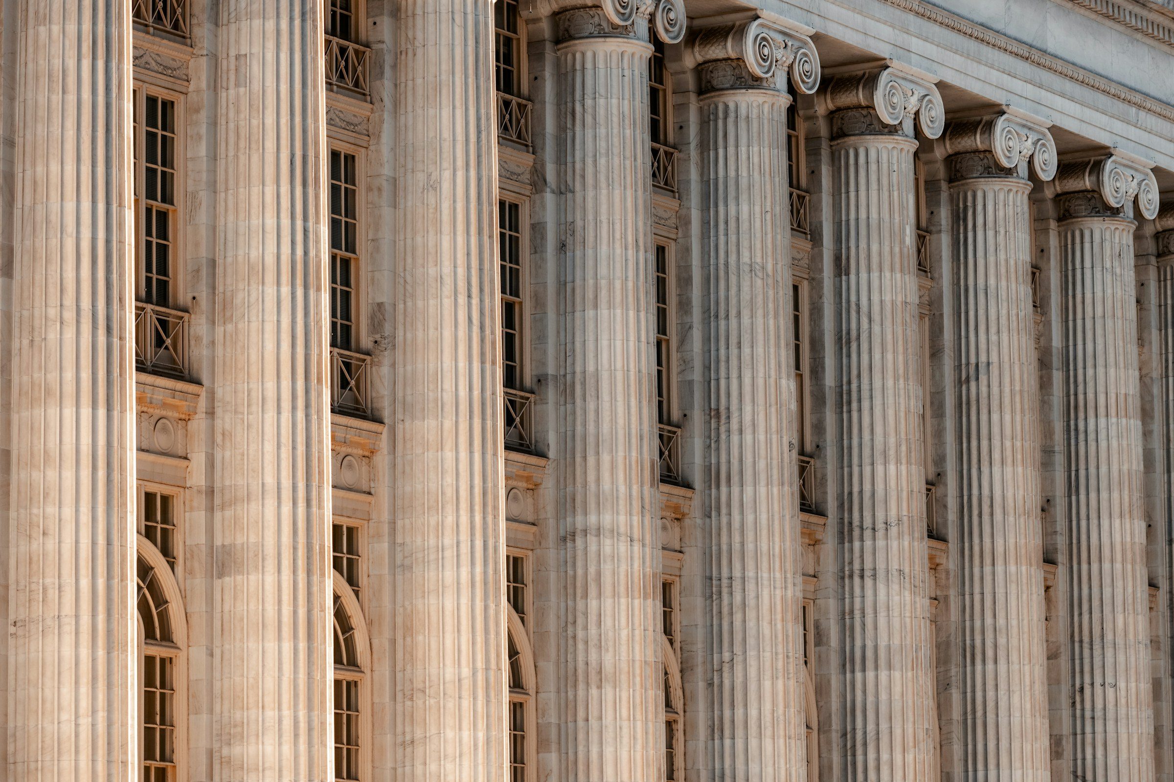 The stone columns of a courthouse facade