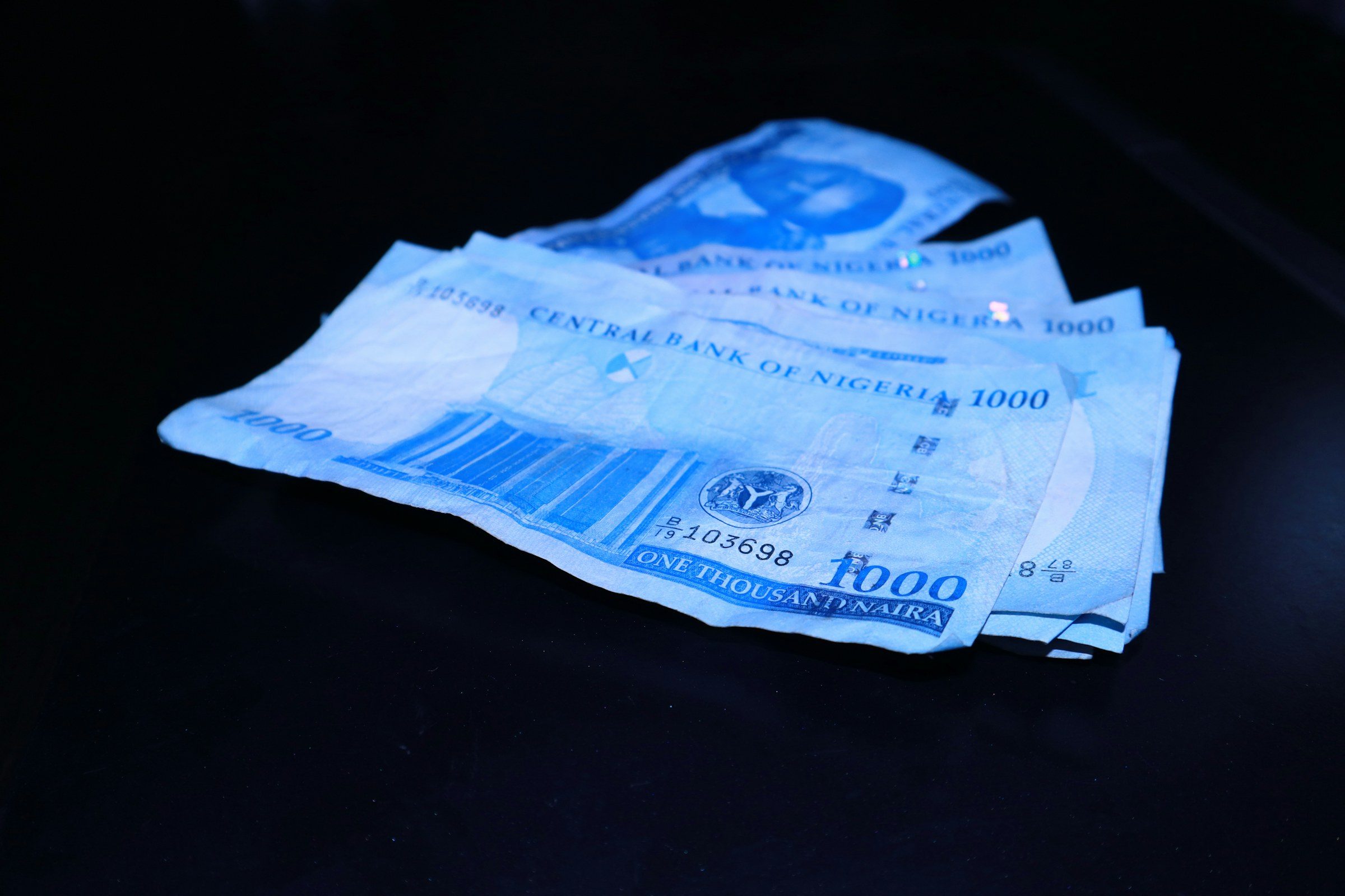 A spread of one-thousand-naira notes
