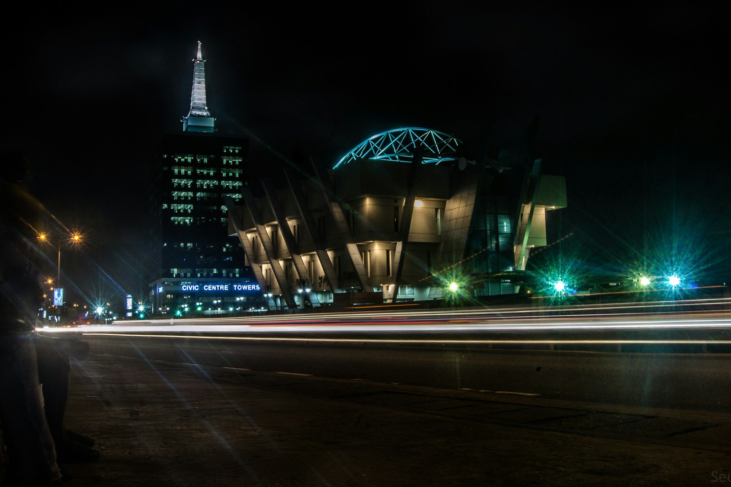 Lagos at night with light trails on the road