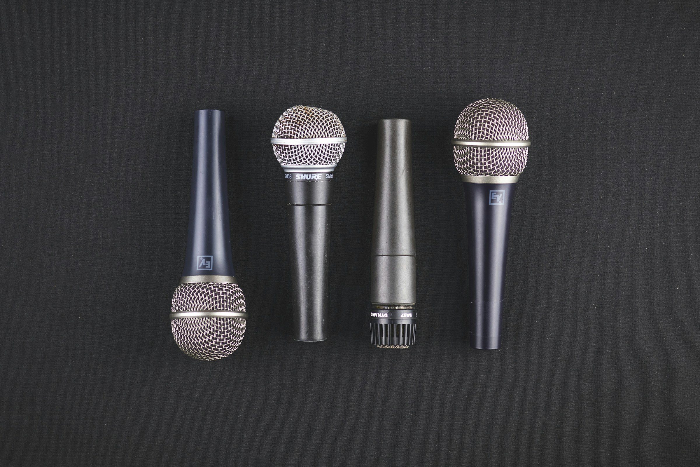 Four microphones laid side by side