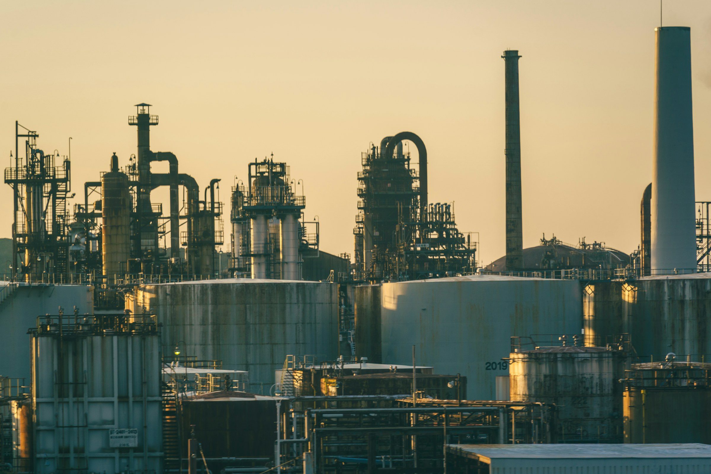 A gas processing plant with storage tanks and pipework