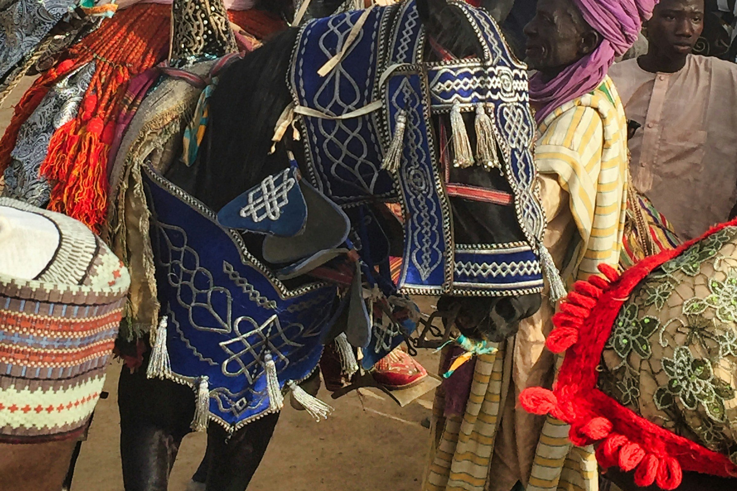 Riders in traditional dress at a northern Nigerian festival