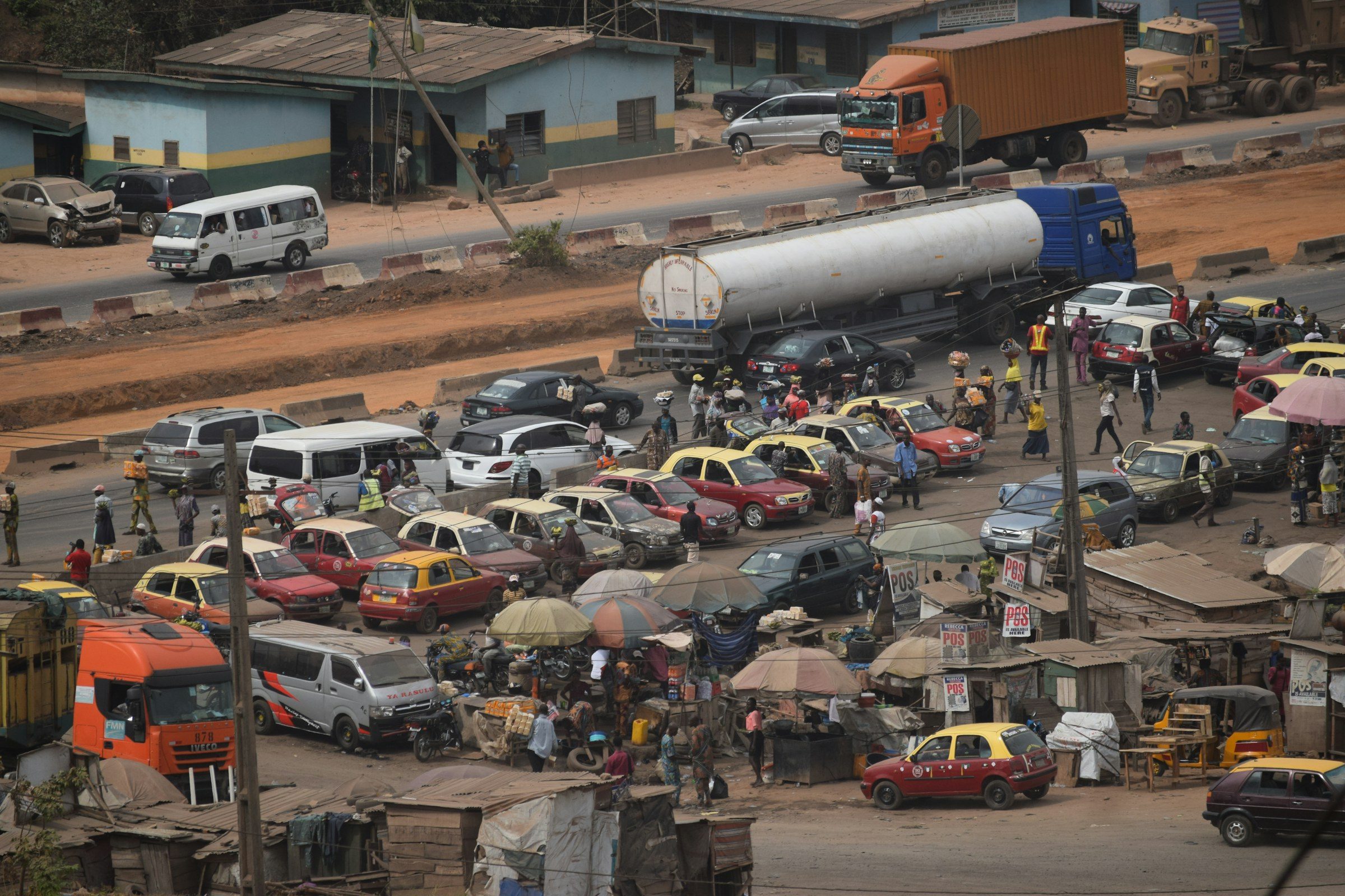 Fuel tankers and vehicles crowded in a depot